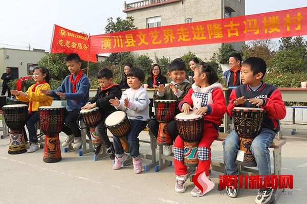 县工信局开展文艺赴隆古冯楼小学志愿服务活动